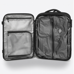An open Nomadity Discoverer vacuum compression travel backpack 60L compressed.