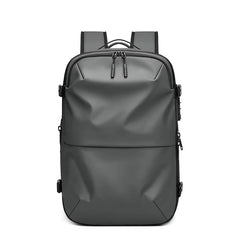Front view of the black Discoverer 60L vacuum compression travel backpack